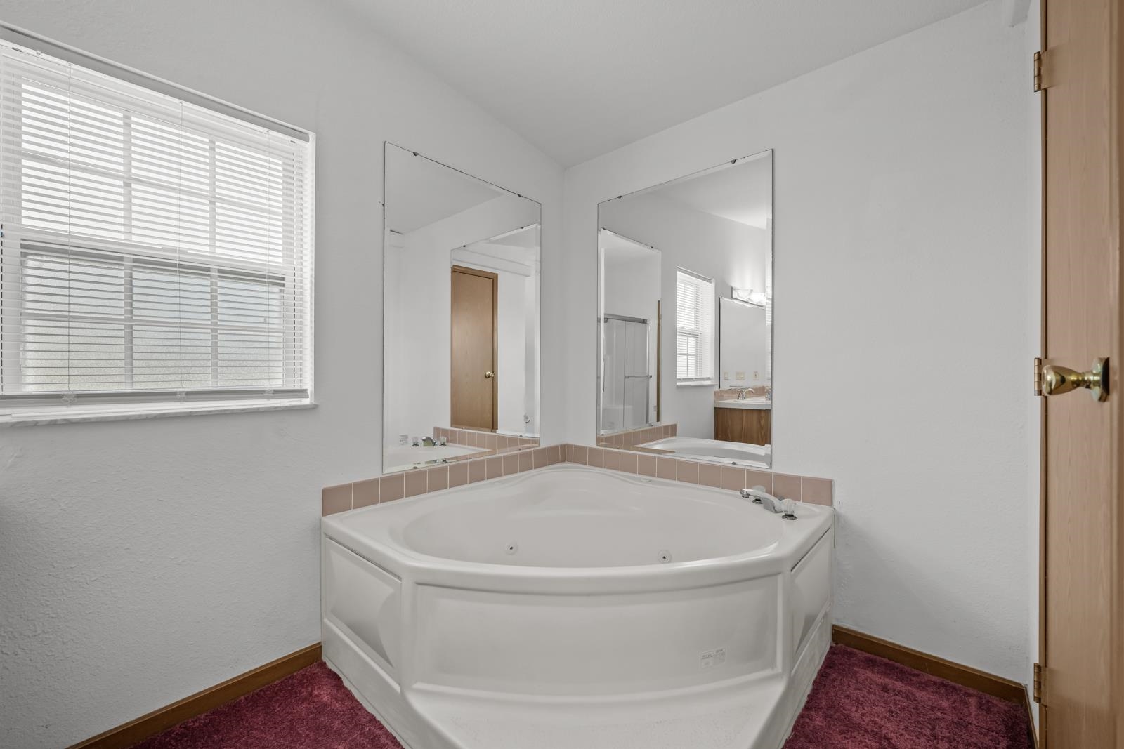 305 Palmetto Bluff Road Palatka, FL 32177 - Photo 17 of 34 Full bathroom featuring a jetted tub and vanity