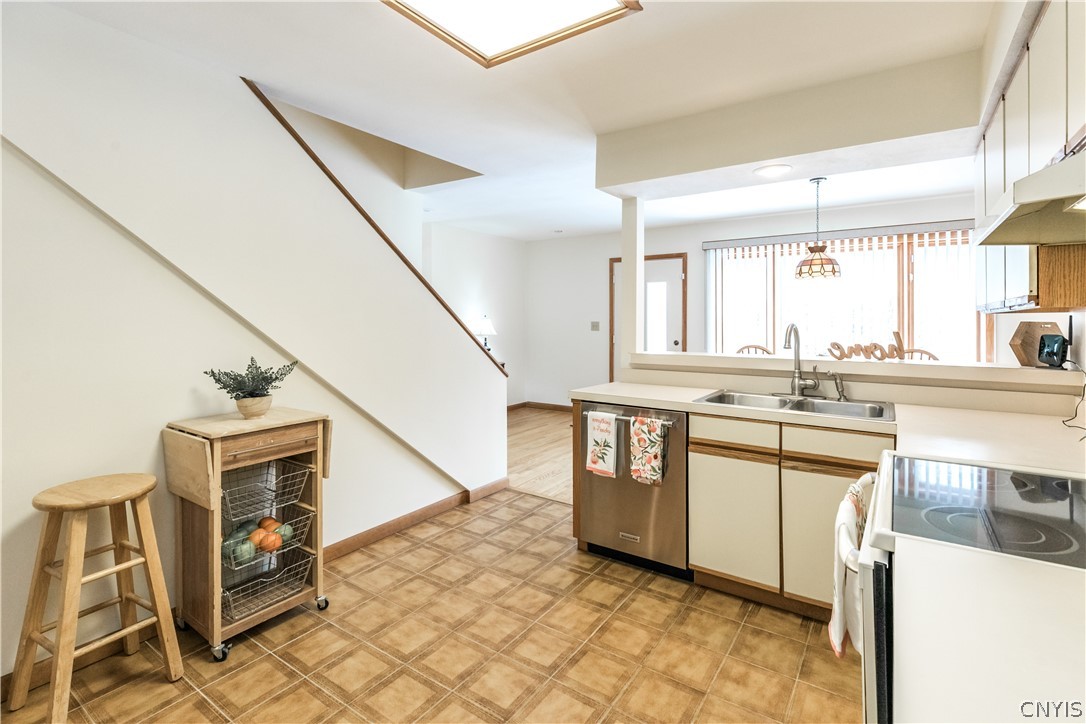 8646 Salt Springs Road Manlius, NY 13104 - Photo 16 of 38 Adjacent to the kitchen are the stairs leading to