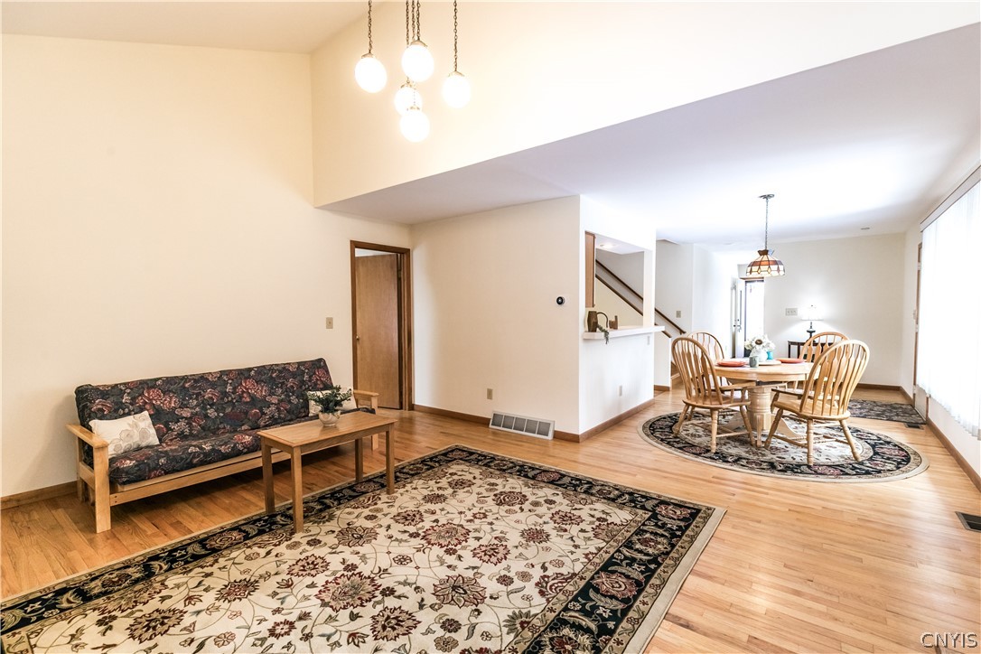 8646 Salt Springs Road Manlius, NY 13104 - Photo 19 of 38 The living room offers easy access to the dining a
