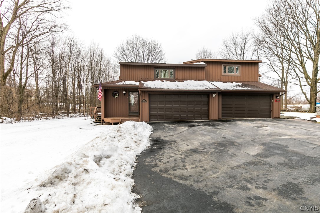 8646 Salt Springs Road Manlius, NY 13104 - Photo 2 of 38 Condo has a large two-car garage and plenty of roo