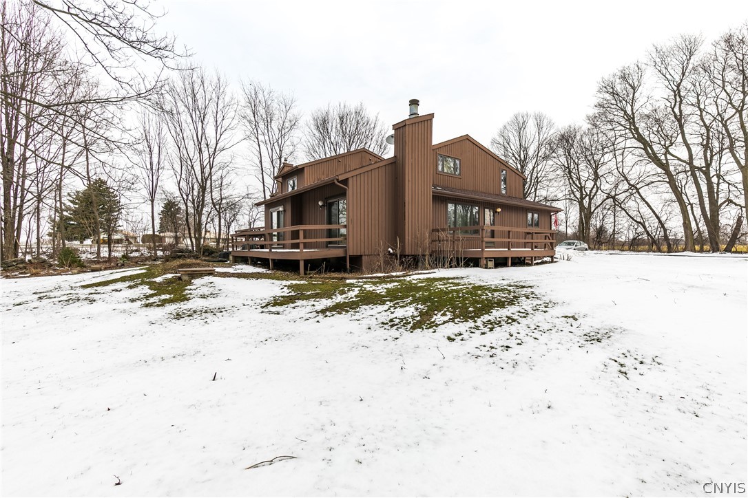 8646 Salt Springs Road Manlius, NY 13104 - Photo 5 of 38 There are two large decks off the living room. And