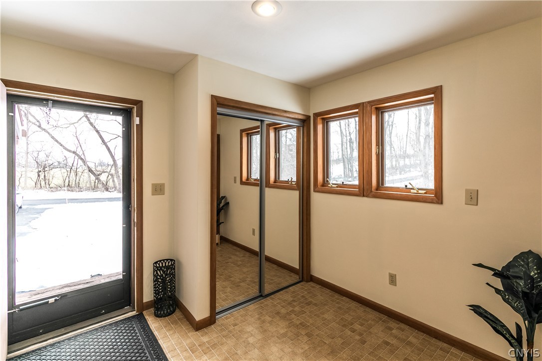 8646 Salt Springs Road Manlius, NY 13104 - Photo 10 of 38 The entry foyer offers two large closets. This one
