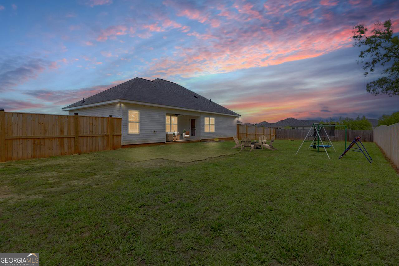 104 Meredith Layne Court Perry, GA 31069 - Photo 42 of 46 a house view with a garden space