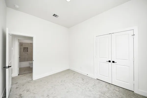 an empty room with closet