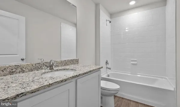 an empty room with closet area
