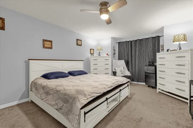 a bedroom with a bed and furniture