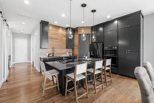 a view of a a dining room with furniture