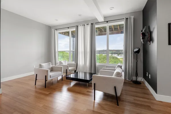 a living room with furniture and a window