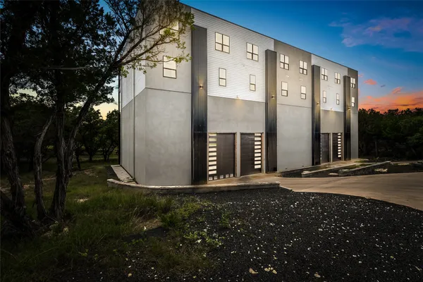 a view of a street with a building