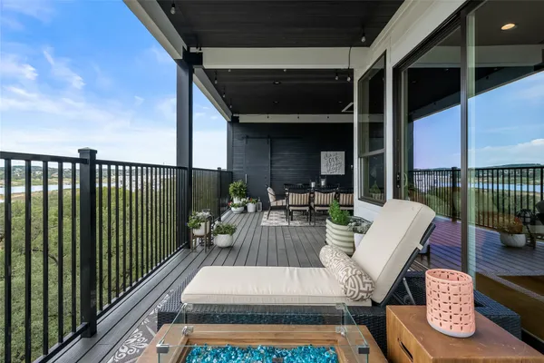 a view of balcony with furniture