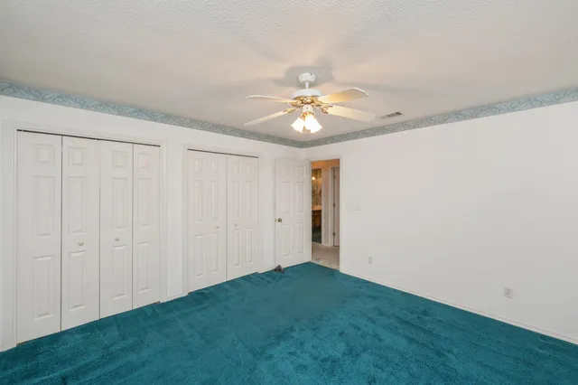 a bathroom with a sink double vanity and a mirror