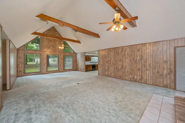 a brick house with a bench in front of it