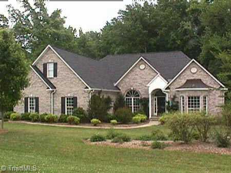 1586 Deer Run Court Oak Ridge, NC 27310 - Photo 1 of 9 Exterior Front.
