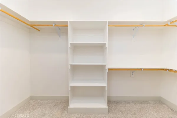 a view of an empty walk in closet