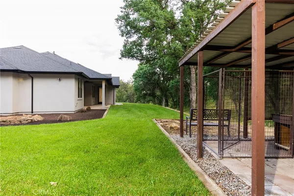 a backyard of a house with seating space