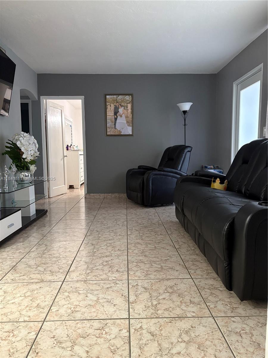 821 East 13th Street Hialeah, FL 33010 - Photo 8 of 25 a living room with furniture