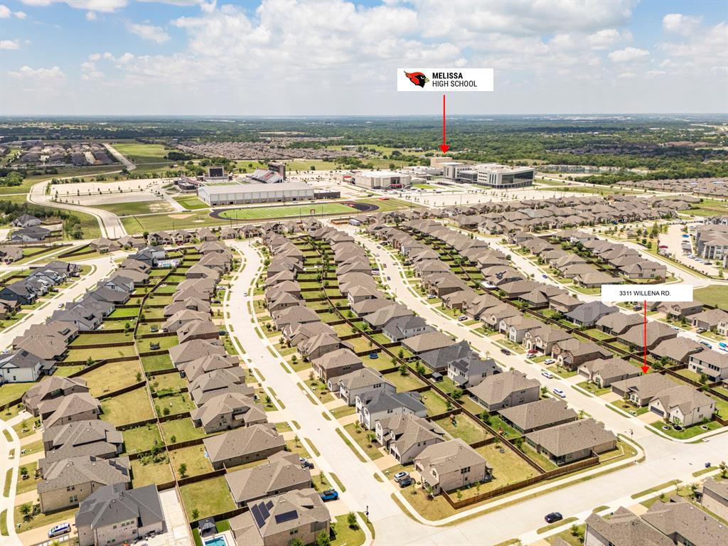 3311 Willena Road Melissa, TX 75454 - Photo 4 of 40 Aerial perspective showcasing a residential neighborhood with numerous single-story and two-story homes featuring tan and gray exteriors and dark roofing