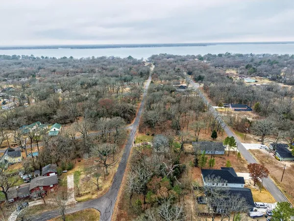 a view of house with yard