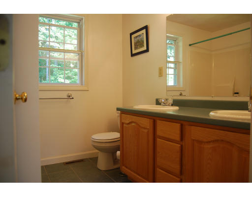 13 Fisher Road Chelmsford, MA 01824 - Photo 16 of 20 a bathroom with a sink and a toilet