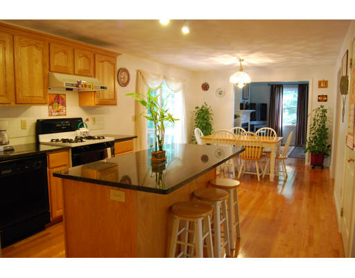 13 Fisher Road Chelmsford, MA 01824 - Photo 4 of 20 a kitchen with a sink and cabinets