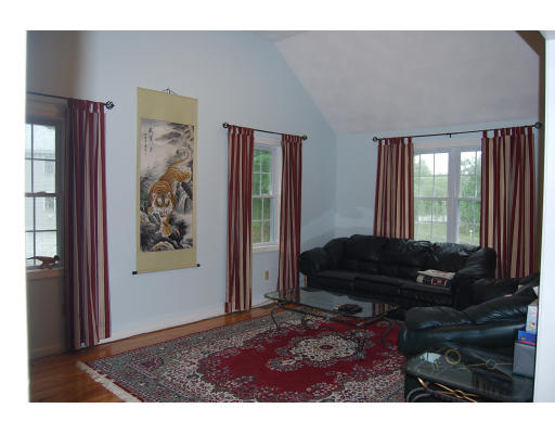 13 Fisher Road Chelmsford, MA 01824 - Photo 6 of 20 a living room with furniture and a window