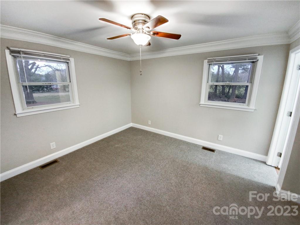 3020 Potter Road Waxhaw, NC 28173 - Photo 13 of 17 a view of an empty room with a window