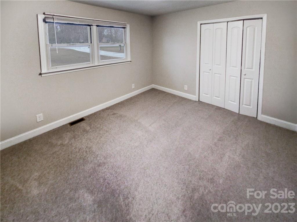 3020 Potter Road Waxhaw, NC 28173 - Photo 15 of 17 a view of an empty room with a window