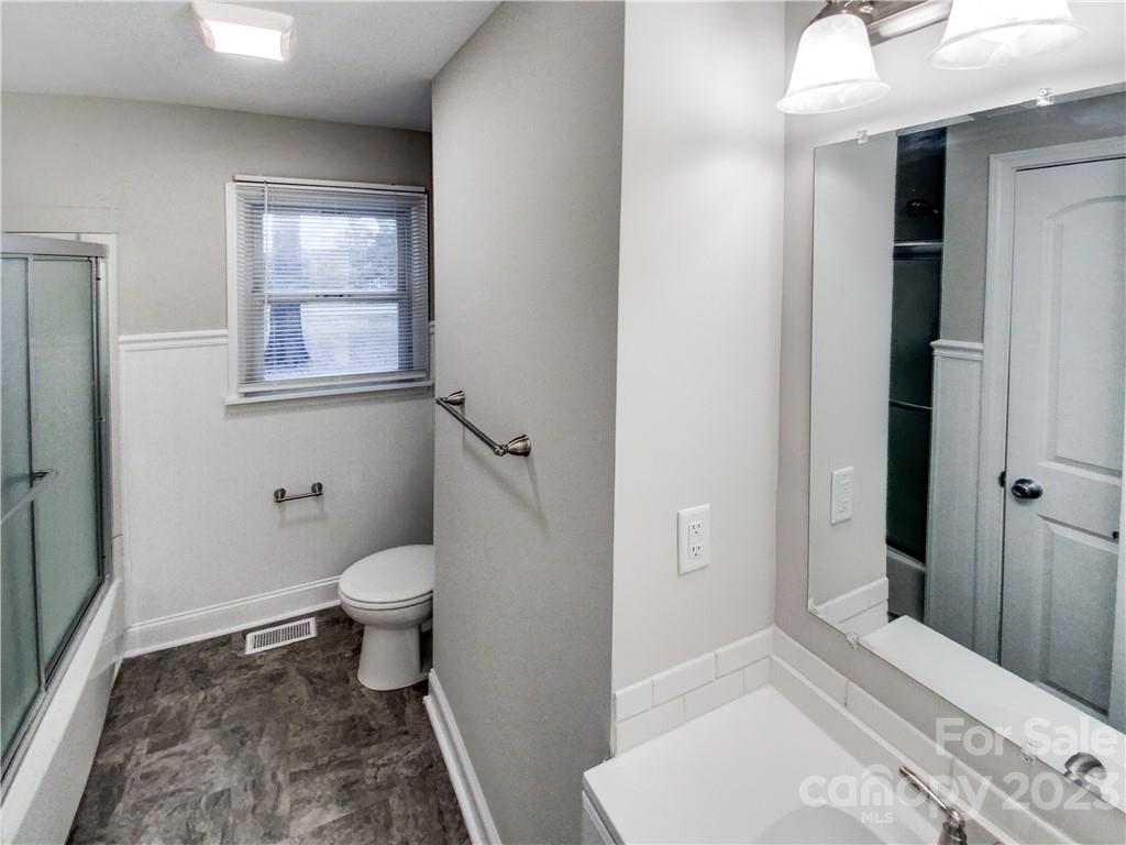 3020 Potter Road Waxhaw, NC 28173 - Photo 10 of 17 a bathroom with a sink toilet and shower