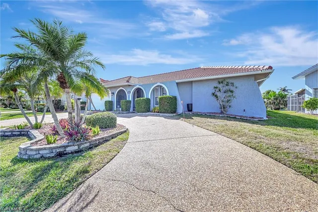 a house view with a garden space