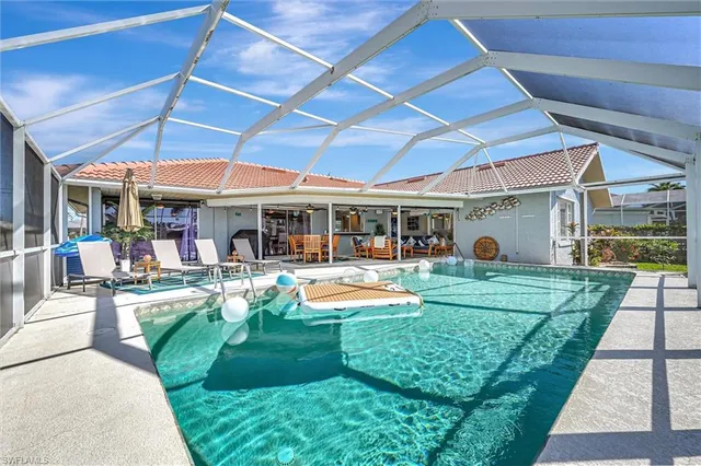 a view of a house with a yard patio and a patio