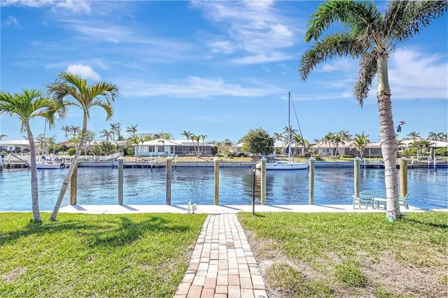 a front view of a house with swimming pool