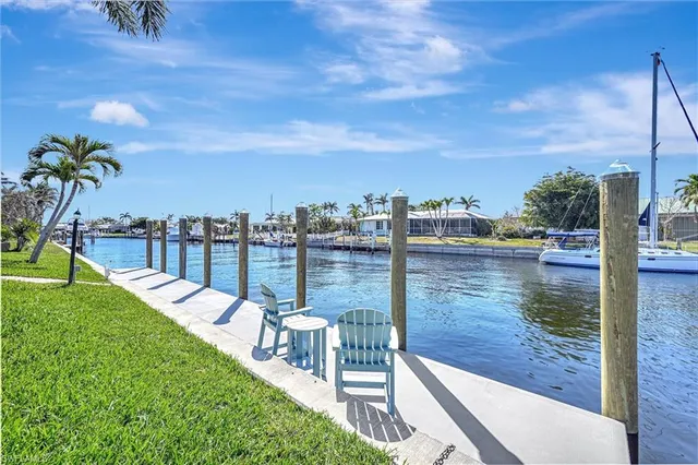 a view of a lake with a yard