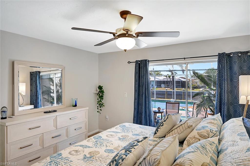 69 Ocean Drive Punta Gorda, FL 33950 - Photo 36 of 44 a bedroom with a large bed and a window