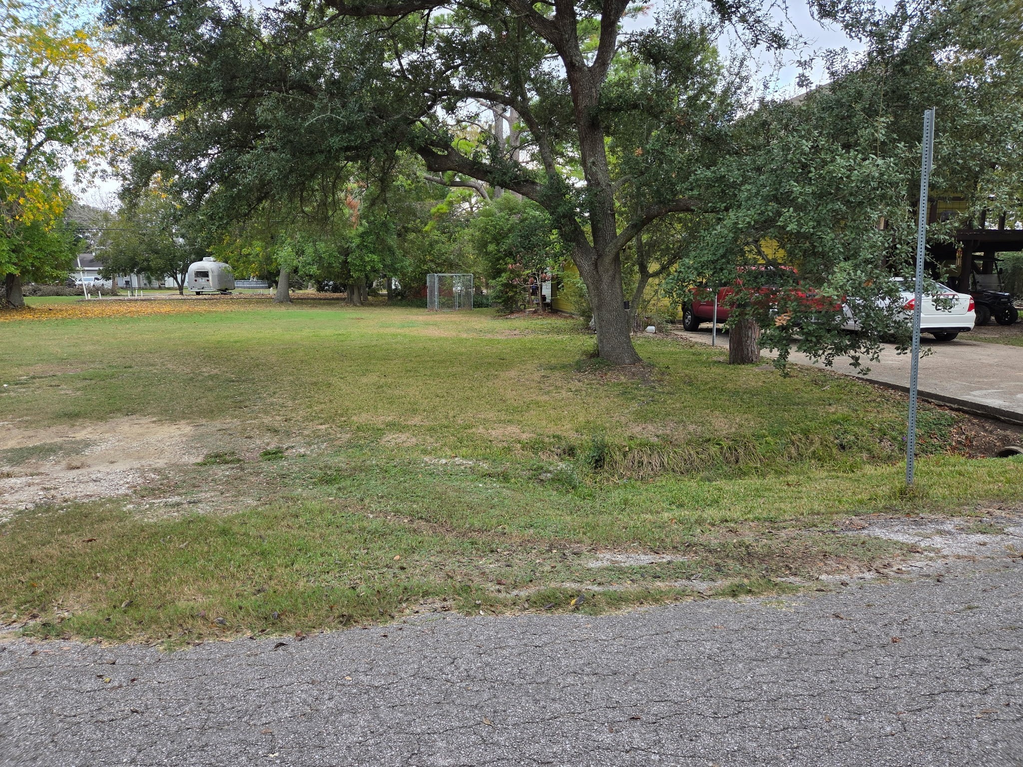 4718 Louise Street Pasadena, TX 77586 - Photo 3 of 3 Nice Oak and Pine trees.