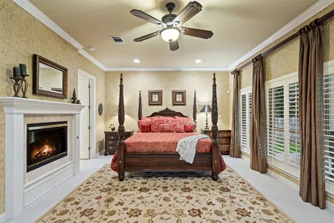 a bed room with a bed and a fireplace