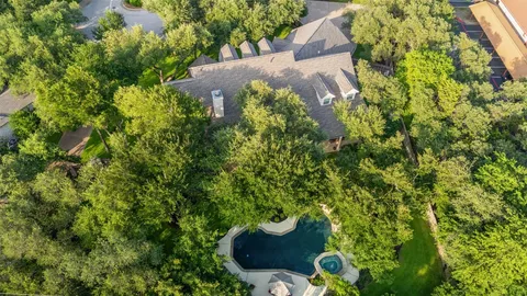 an aerial view of a house with garden