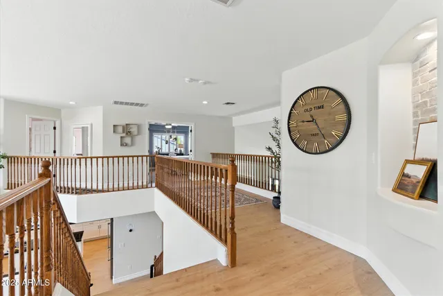 a bed room with two beds and a large window