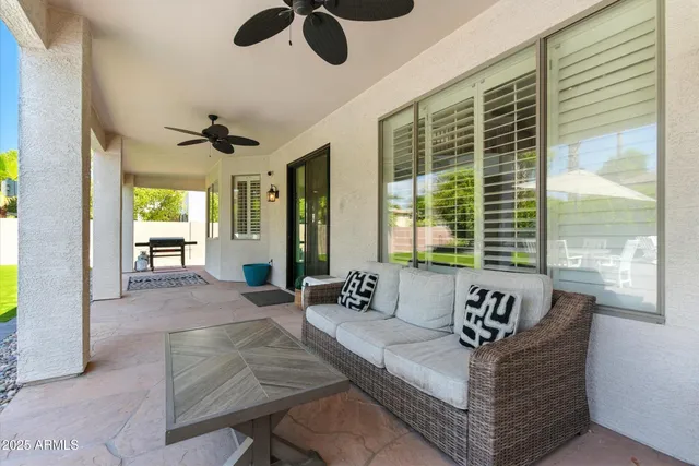 a view of a backyard with swimming pool