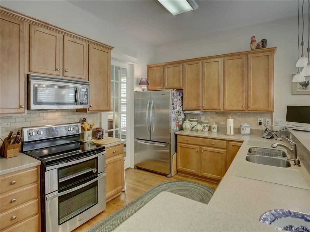 761 Shady Grove Crossing Fort Mill, SC 29708 - Photo 12 of 48 a kitchen with a refrigerator stove and microwave