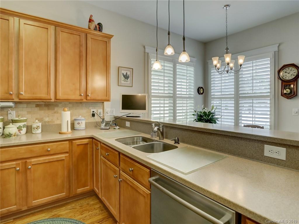 761 Shady Grove Crossing Fort Mill, SC 29708 - Photo 13 of 48 a kitchen with a sink and cabinets