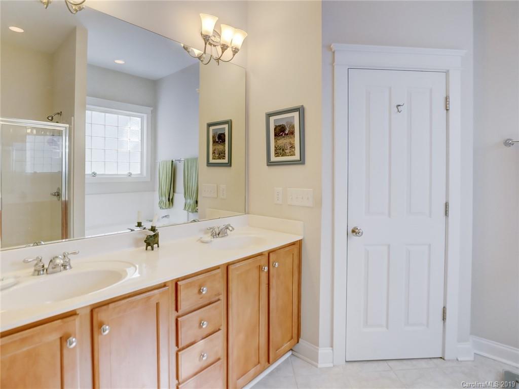761 Shady Grove Crossing Fort Mill, SC 29708 - Photo 19 of 48 a bathroom with a sink double vanity and a mirror