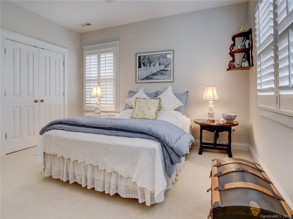 761 Shady Grove Crossing Fort Mill, SC 29708 - Photo 24 of 48 a bedroom with a bed and a window
