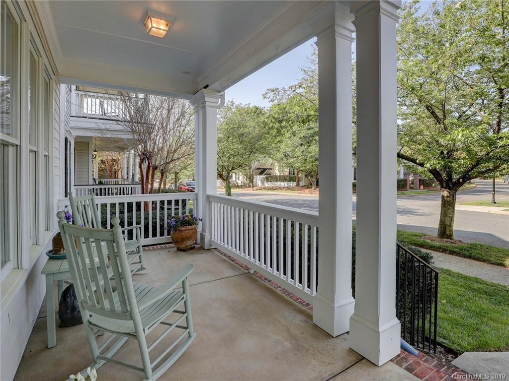761 Shady Grove Crossing Fort Mill, SC 29708 - Photo 4 of 48 a view of a chair and tables in the balcony