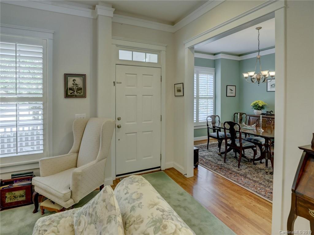 761 Shady Grove Crossing Fort Mill, SC 29708 - Photo 7 of 48 a living room with furniture and a dining table