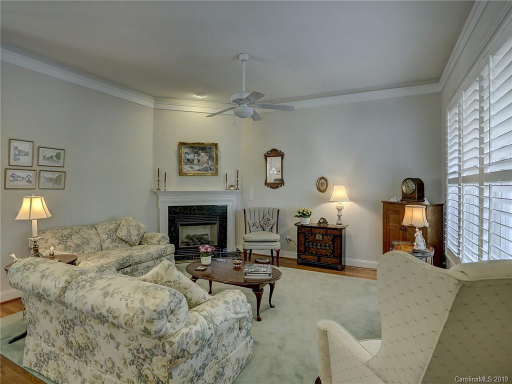 761 Shady Grove Crossing Fort Mill, SC 29708 - Photo 8 of 48 a living room with furniture and a fireplace