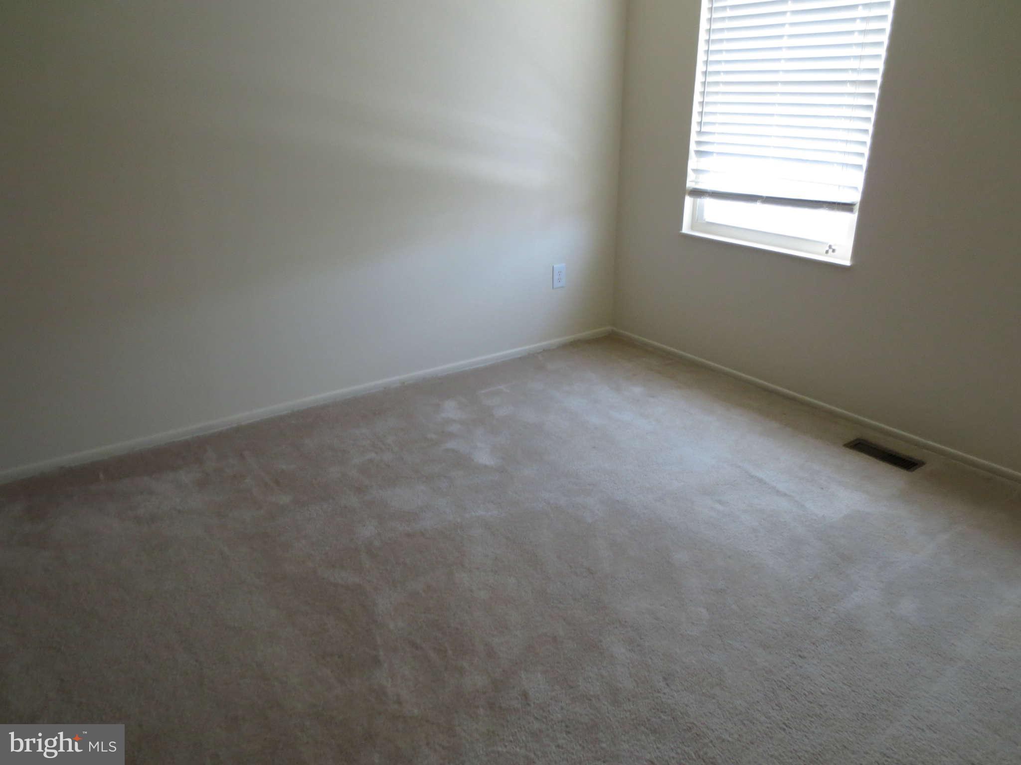 17609 Kohlhoss Road Poolesville, MD 20837 - Photo 8 of 8 an empty room with a window