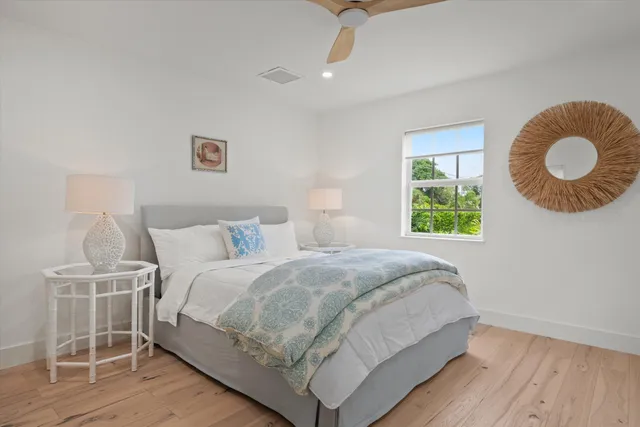 a view of a chair and table on the garden