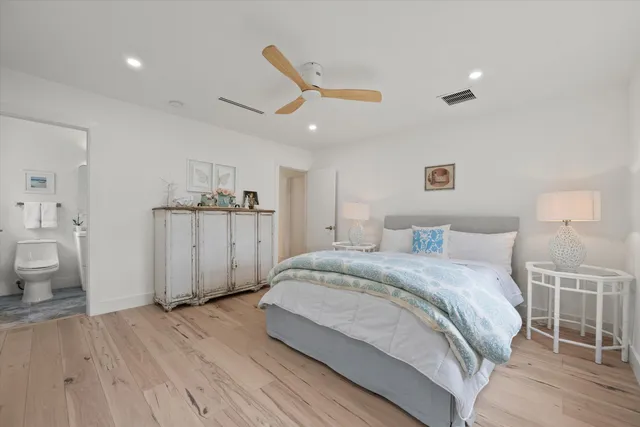 a view of a chair and table in the garden