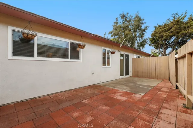 a view of a backyard of the house