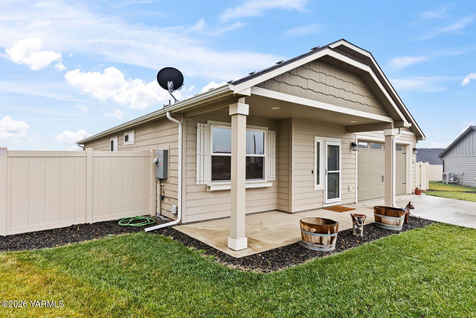 403 Lambert Court Grandview, WA 98930 - Photo 27 of 27 a view of a house with backyard and porch